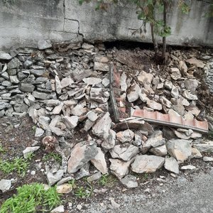 Rénovation d'un mur de soutènement, bâti en pierres